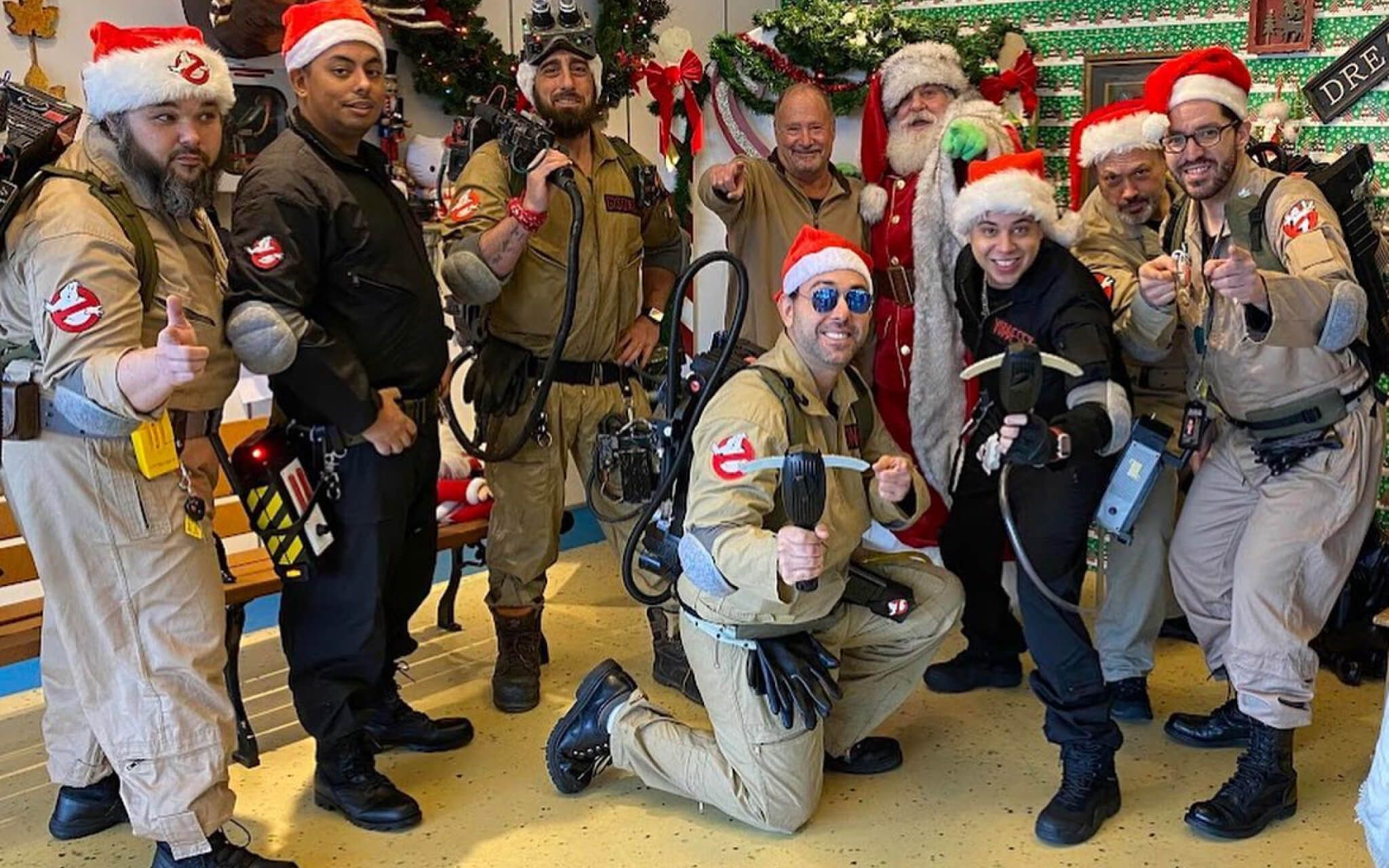 NYC Ghostbusters hanging out with Santa Claus at a toy drive in Queens.